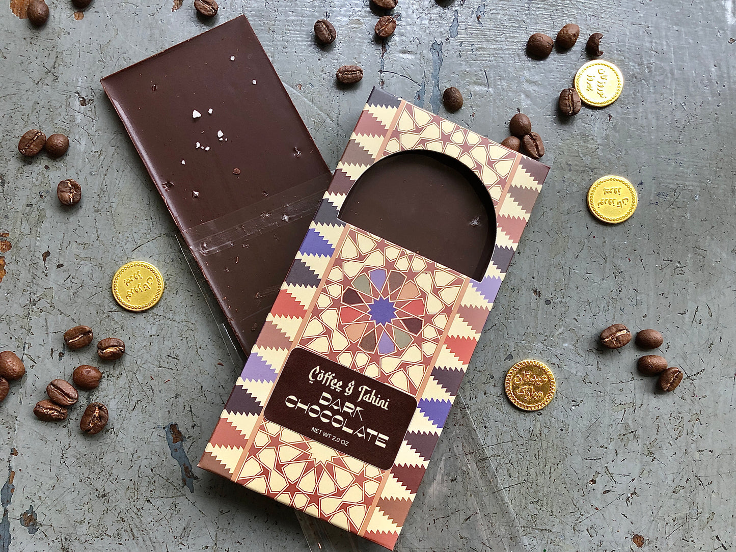 Coffee and Tahini Dark Chocolate Bar with gold coins and coffee beans